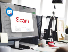 Auf einem Computer-Bildschirm erscheint eine Scam-Warnung.